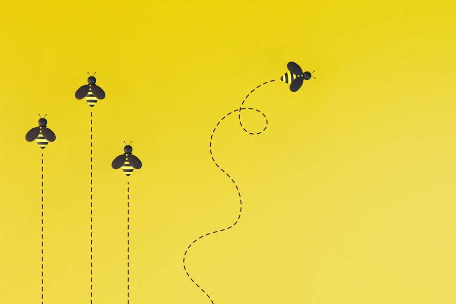 Des illustrations 3D d'abeilles sur un fond jaune